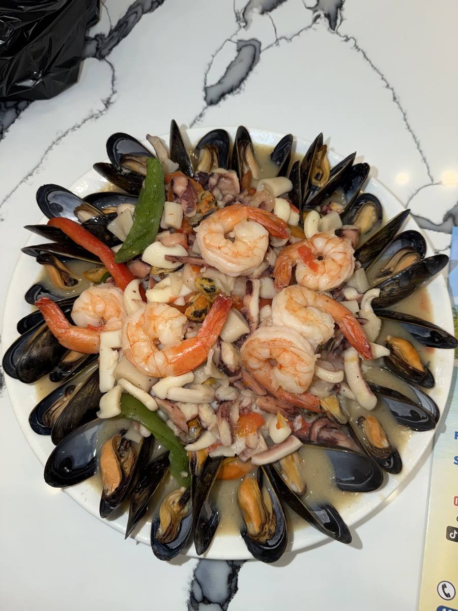 Calamari, mussels and shrimp in red sauce
